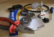 Appliance spare parts and tools on the workbench